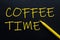 Coffee time Yellow Pen with yellow text own rent at the black background