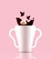 Coffee for two. Coffee cup with two handles. Coffee with sugar and coffee splashes. Pink background