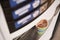 Coffee vending machine with paper cup on drip tray