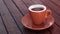 Coffee on wooden brown table