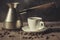 coffeemaker and white cup from coffee on a wooden background/coffeemaker and white cup from coffee on a wooden background. Toned