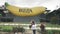 Coffs Harbour, AUSTRALIA- March, 9, 2017: tourists pose for a photo at the famous big banana at coffs harbour