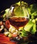 Cognac Pour In Glass, Grapes And Vine, Vintage Wood Background,