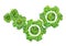 Cogs or gears from green grass isolated