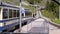 Cogwheel train rides in the snowy mountains on the railway. Switzerland, Alps