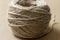 A coil of jute rope used for needlework