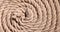 Coil of old vintage sailboat rope as background texture