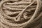 Coil of rope with marine knot loop.