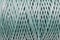 Coiled nylon rope texture background. Blue rolled  striped nylon rope pattern. A coil of new colored rope surface