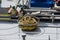 Coiled yellow ship hawsers on the deck of an inland tanker