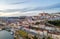 Coimbra drone aerial city view at sunset with Mondego river and beautiful historic buildings, in Portugal