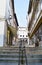 Coimbra, Portugal, August 13, 2018: Street called quebra costas bankruptcy backs in the old part of the city with many flights o