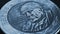 Coin of 500 Chilean pesos lies on a dark surface. Closeup. Peso of Chile. News about economy or money. Loan and credit. Interest