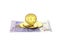 Coin bitcoin lies with european euro banknotes. Banknotes zero euro on an isolated white background. Bitcoin drop concept,