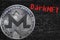 Coin cryptocurrency Monero XMR and black bricks wall Darknet.