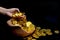 Coin gold in lady hand on lots stacking golden coins in broken jar white background, Money stack for business planning investment