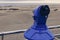 Coin-operated binocular looking out sand desert dunas