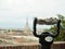 Coin operated binocular viewer next to the city of Turin