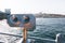 Coin Operated Binocular viewer next to the waterside promenade in Istanbul, Turkey looking out to Bosphorus Strait and city.