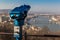 Coin operated public binoculars at Budapest. Blue telescope on observation deck