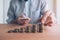 Coin stacker, businessman with stacked money