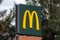 Coina, Portugal - October 23, 2019: The Golden Arches, the symbol or logo of McDonaldâ€™s on top of a signboard at the entrance of