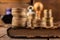 Coins arranged in bars on an old book. An accountant's workplace in an old company