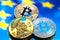 Coins Bitcoin, against the backdrop of Europe and the European flag, the concept of virtual money, close-up. Conceptual image.