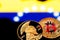 coins Bitcoin, amid Colombia flag, concept of virtual money, close-up. Conceptual image.