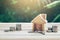 Coins, houses, keys placed on a wooden table. planning savings money of coins to buy a home