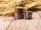 coins on ripe wheat and straw detail on blur background