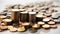 Coins stacked on a white background, isolated.