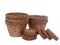 Coir, coconut fibre, plant pots and growing pellets, discs, isolated on white background. Environmentally friendly peat