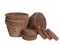 Coir, coconut fibre, plant pots and growing pellets, discs, isolated on white background. Environmentally friendly peat