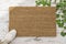 Coir doormat mockup Green plant wooden background