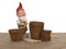 Coir plant pots and compressed compost with wooden labels and generic garden gnome. Environmentally friendly spring