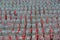 Coke Bottles Lined Up for Ring Toss