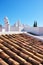 Colahonda - the beautiful coastal city of Andalusia, Spain. Beautiful chimneys and ventilation tubes in the city of