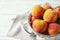 Colander with delicious ripe peaches