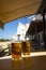 Cold amber color light spanish beer served in glass in outdoor cafe in town on sand, El Rocio in Andalusia, Spain