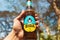 Cold bottle of India`s craft beer Bira 91 in a hand of drinker. Young company B9 Beverages owns Bira 91.