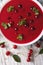 Cold cherry soup in a bowl on a table close-up. vertical top vie