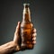 Cold delight Isolated hand clutches a refreshing beer bottle
