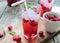 Cold drink with fresh rasberries fruits