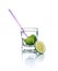 Cold drink with lime and drinking straw.