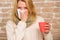 Cold and flu remedies. Remedies should help beat cold fast. Tips how to get rid of cold. Woman feels badly ill sneezing