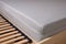 Cold foam mattress on slatted frame