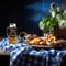 Cold full beer mug with Beirian pretzels on the wooden table covered with traditional blue and white tablecloth during Oktoberfest