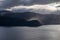 Cold grey color Norway landscape on fjord coast