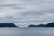 Cold grey color Norway landscape on fjord coast